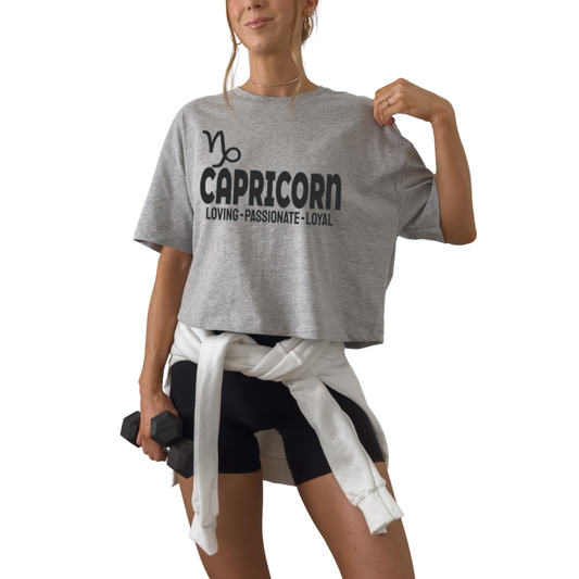 Capricorn zodiac horoscope t-shirt with “Loving. Passionate. Loyal.” Astrology graphic tee for December and January earth sign birthdays.