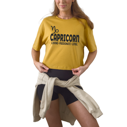 Capricorn zodiac horoscope t-shirt with “Loving. Passionate. Loyal.” Astrology graphic tee for December and January earth sign birthdays.