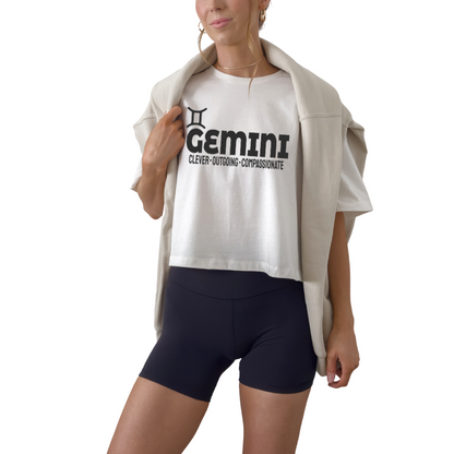 Gemini zodiac horoscope t-shirt featuring “Clever. Outgoing. Compassionate.” Astrology graphic tee for May and June air sign birthdays.