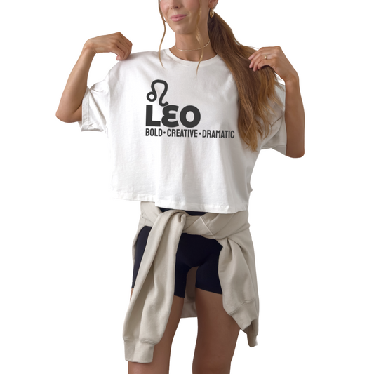 Leo zodiac horoscope t-shirt featuring “Bold. Creative. Dramatic.” Astrology graphic tee for July and August fire sign birthdays.