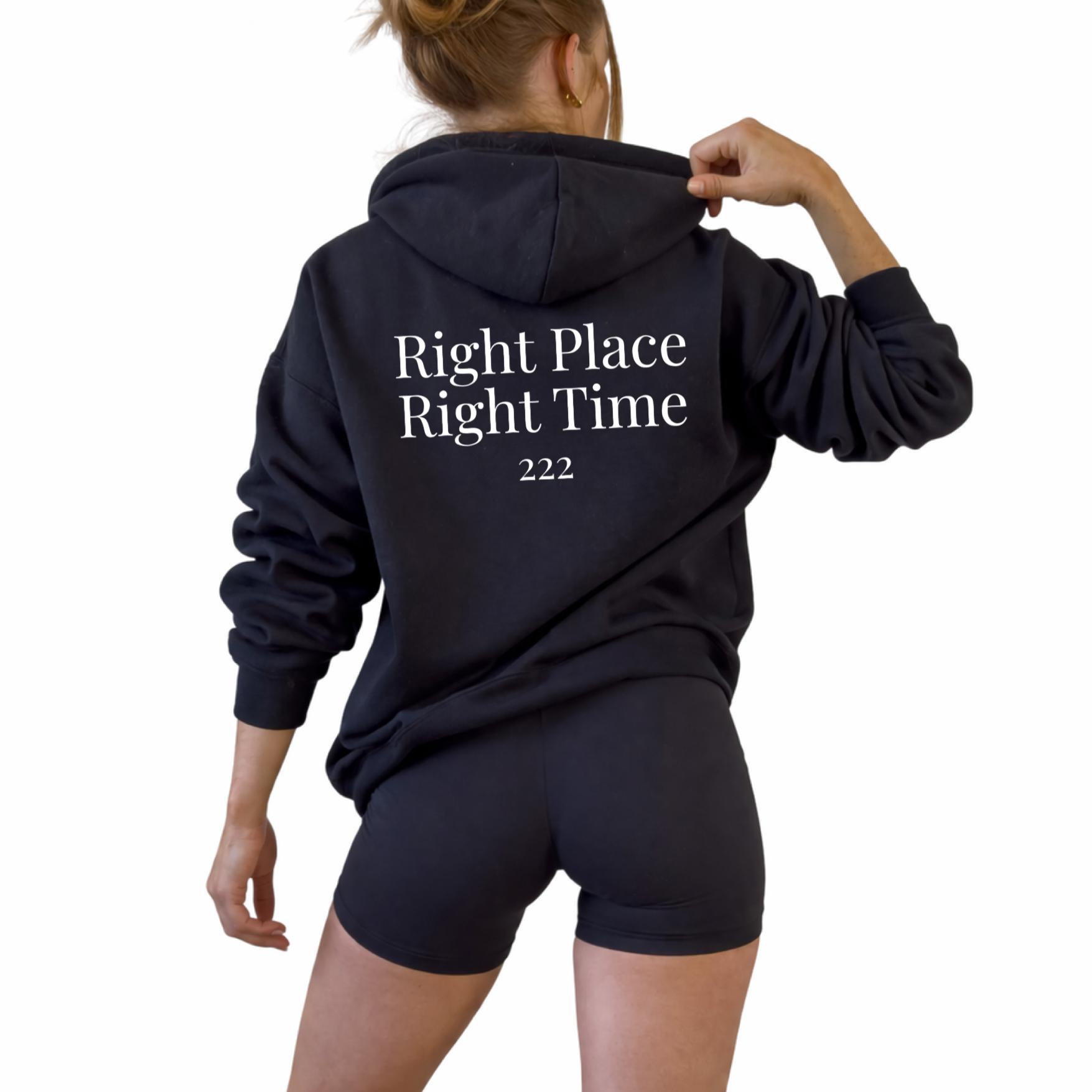 Unisex angel number 222 black hoodie featuring minimal front numerology design and back print reading right place right time, spiritual alignment sweatshirt for divine timing, balance and synchronicity, soft cozy hooded pullover, neutral aesthetic hoodie for everyday casual wear and mindful living