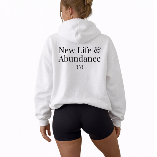 Unisex angel number 333 hoodie with clean front numerology design and back print reading new life and abundance, manifestation sweatshirt for spiritual growth and expansion, cozy hooded pullover with relaxed fit, neutral aesthetic hoodie for daily wear, abundance mindset clothing piece