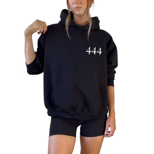 Unisex hooded black sweatshirt featuring angel number 444 on the front and “You Are Divinely Protected” text design, spiritual hoodie symbolizing protection, guidance, manifestation, and positive energy, soft cozy fabric ideal for everyday wear, mindfulness apparel, numerology inspired fashion piece