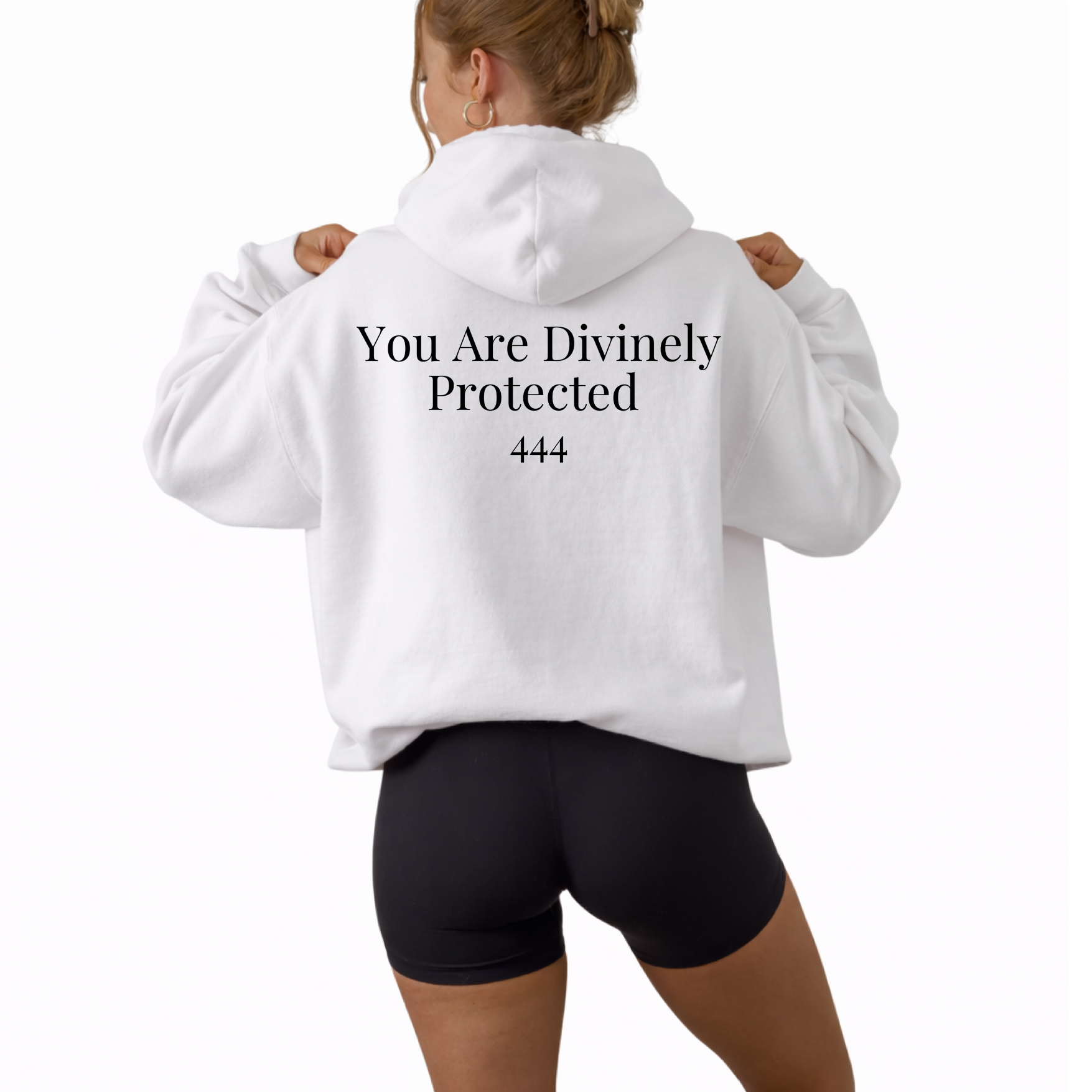 Unisex white hooded sweatshirt featuring angel number 444 on the front and “You Are Divinely Protected” text design, spiritual hoodie symbolizing protection, guidance, manifestation, and positive energy, soft cozy fabric ideal for everyday wear, mindfulness apparel, numerology inspired fashion piece