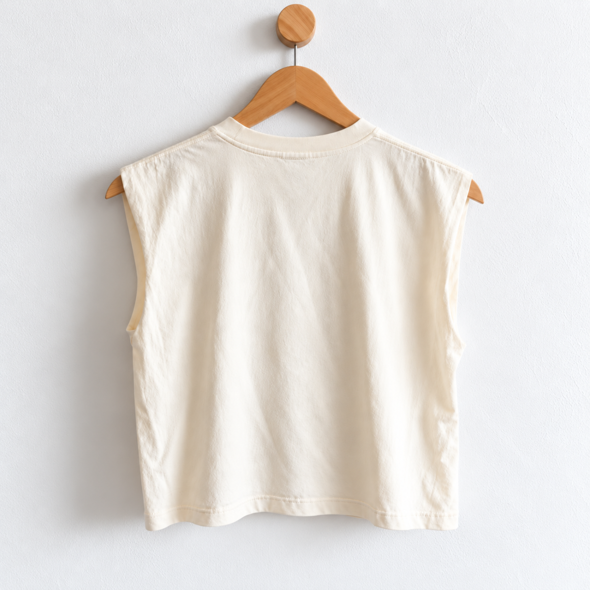 Back view of Badass Women muscle tank with a relaxed boxy mid length fit, created for strong women, best friends, and women who believe in lifting each other up.