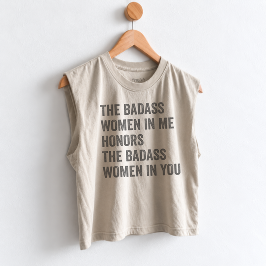 Women’s muscle tank featuring “The Badass Woman in Me Honors the Badass Woman in You,” an empowering graphic for strong women, friendship, confidence, and women supporting women. Fineish