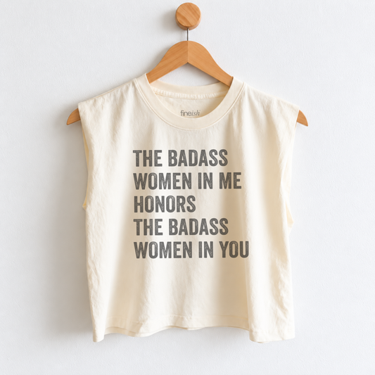 Women’s muscle tank featuring “The Badass Woman in Me Honors the Badass Woman in You,” an empowering graphic for strong women, friendship, confidence, and women supporting women. Fineish