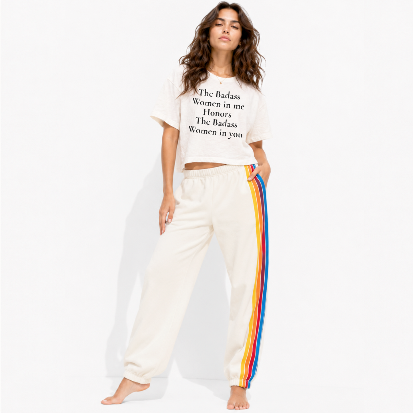 Model wearing a relaxed women’s boxy crop graphic tee with an empowering women-supporting-women message.