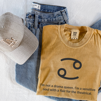 Cancer zodiac graphic t-shirt with “I’m Not a Drama Queen, I’m a Sensitive Soul with a Flair for the Theatrical.” Funny astrology shirt for June and July birthdays. Water sign unisex tee for horoscope lovers.
