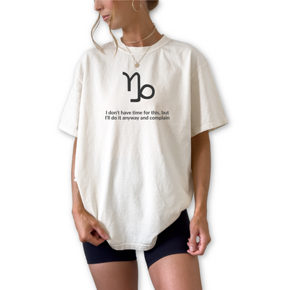 Capricorn zodiac t-shirt featuring “I Don’t Have Time for This, But I’ll Do It Anyway and Complain.” Funny astrology shirt for December and January birthdays. Earth sign graphic tee for ambitious, hardworking horoscope lovers. Trendy Horoscope clothing. 