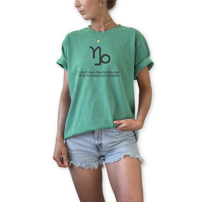 Capricorn zodiac t-shirt featuring “I Don’t Have Time for This, But I’ll Do It Anyway and Complain.” Funny astrology shirt for December and January birthdays. Earth sign graphic tee for ambitious, hardworking horoscope lovers. Trendy Horoscope clothing. 