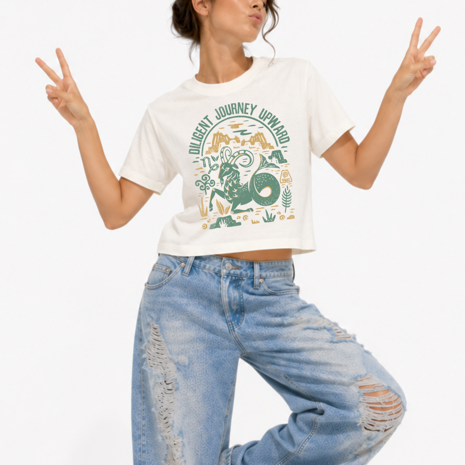 Women's Cosmic Energy heavyweight washed graphic T-shirt featuring the Capricorn zodiac sign.
