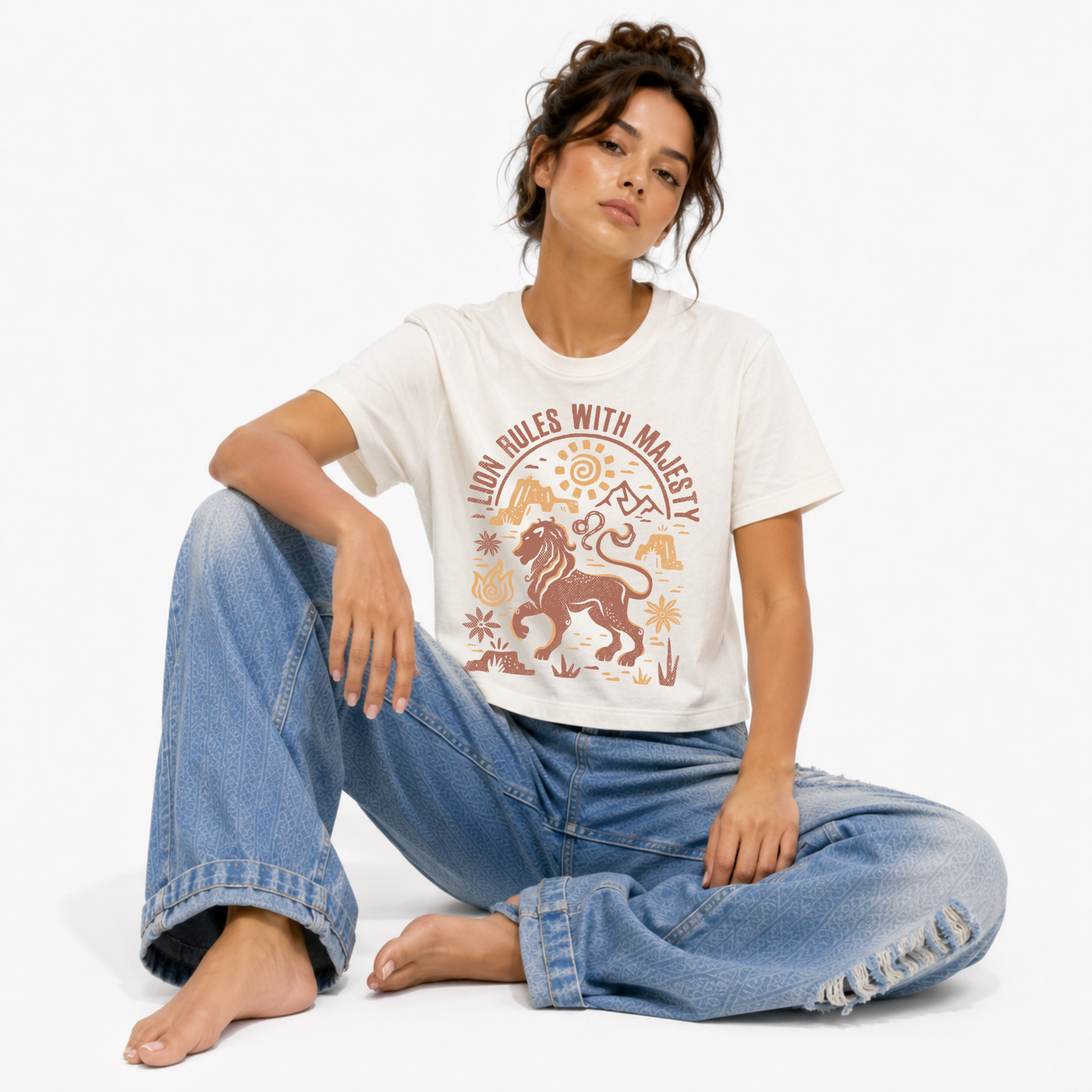 Women's Cosmic Energy heavyweight washed graphic T-shirt featuring the Leo zodiac sign.
