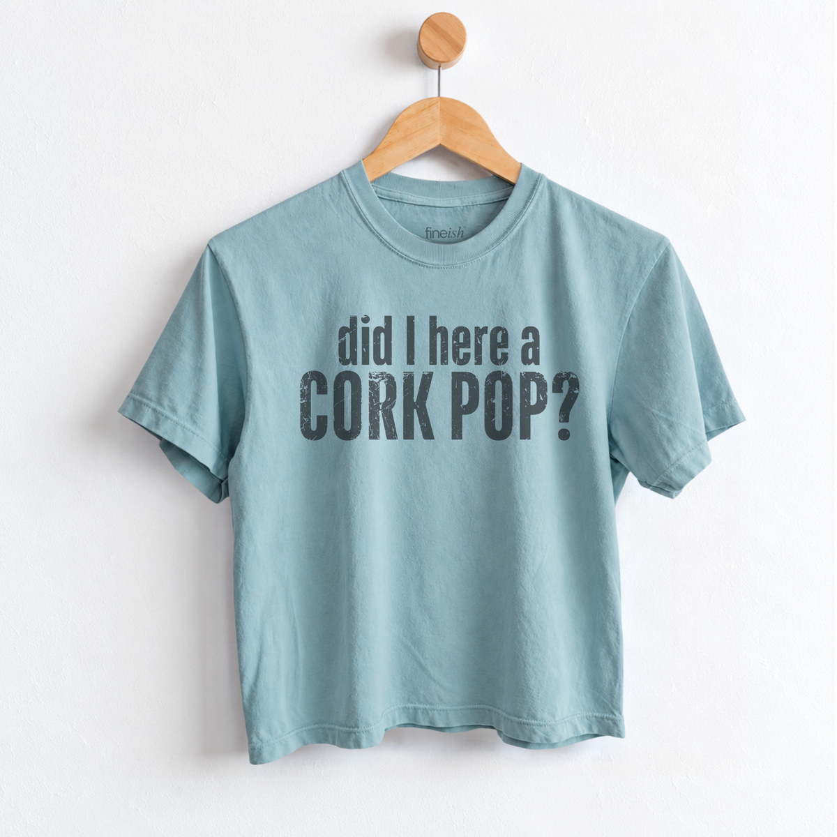 Women’s Did I Hear a Cork Pop graphic tee featuring a funny wine lover saying, perfect for wine nights, girls night, happy hour, and casual everyday outfits.