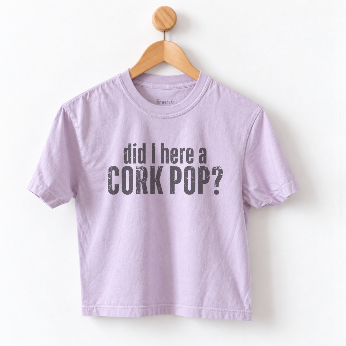 Women’s Did I Hear a Cork Pop graphic tee featuring a funny wine lover saying, perfect for wine nights, girls night, happy hour, and casual everyday outfits.