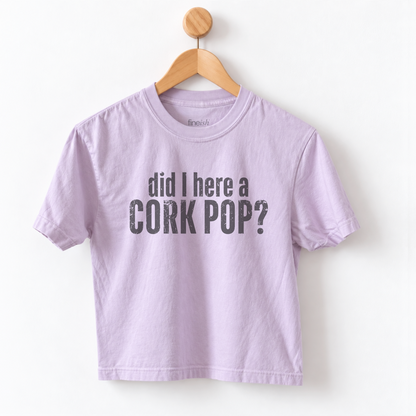 Women’s Did I Hear a Cork Pop graphic tee featuring a funny wine lover saying, perfect for wine nights, girls night, happy hour, and casual everyday outfits.