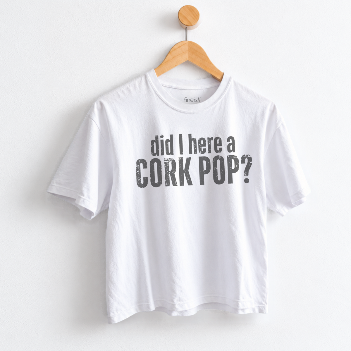 Women’s Did I Hear a Cork Pop graphic tee featuring a funny wine lover saying, perfect for wine nights, girls night, happy hour, and casual everyday outfits.