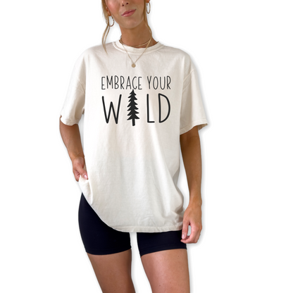 Nature inspired Embrace Your Wild hiking shirt on unisex graphic tee. Outdoor adventure t-shirt for mountain and camping lovers.