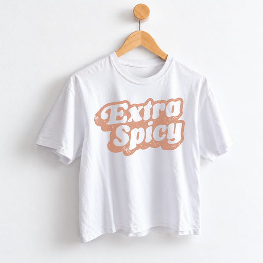 Women’s Extra Spicy graphic tee featuring a funny bold saying, garment dyed fabric, mid length silhouette, relaxed fit, crew neckline, and casual everyday style.