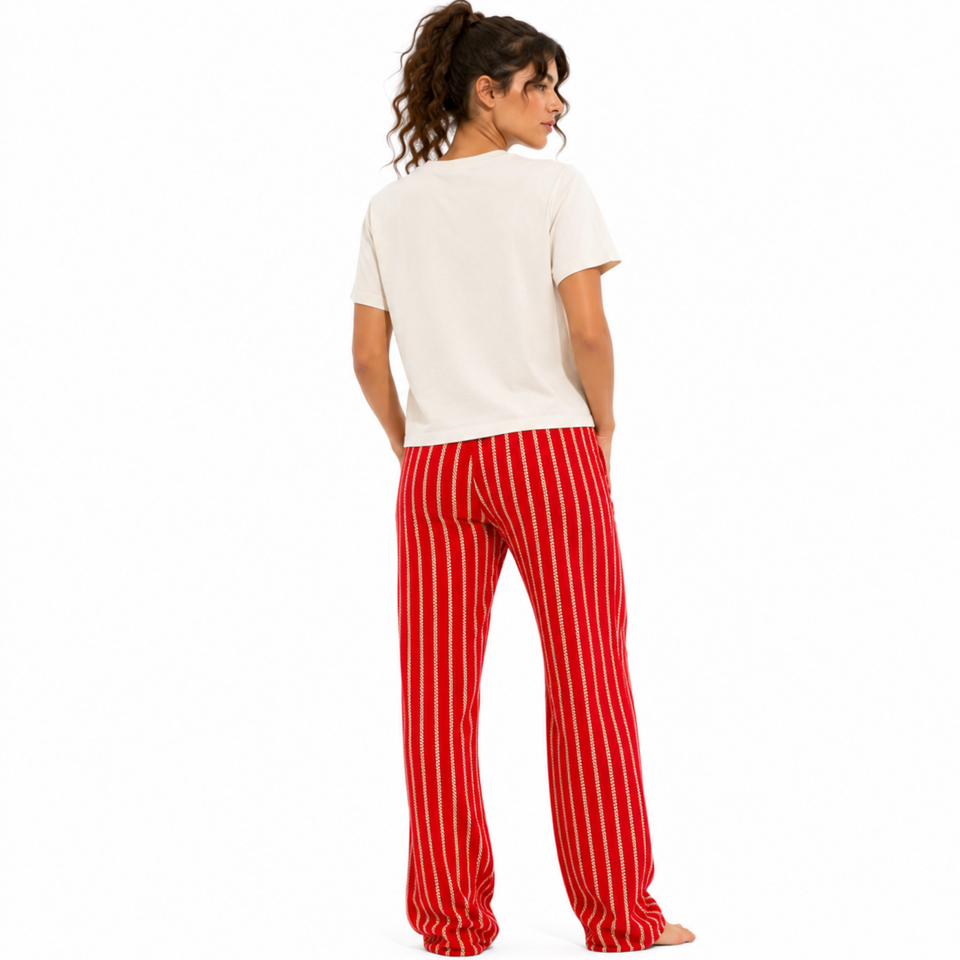 Back view of a vintage white women’s garment-dyed T-shirt showing the plain back and relaxed mid-waist fit.