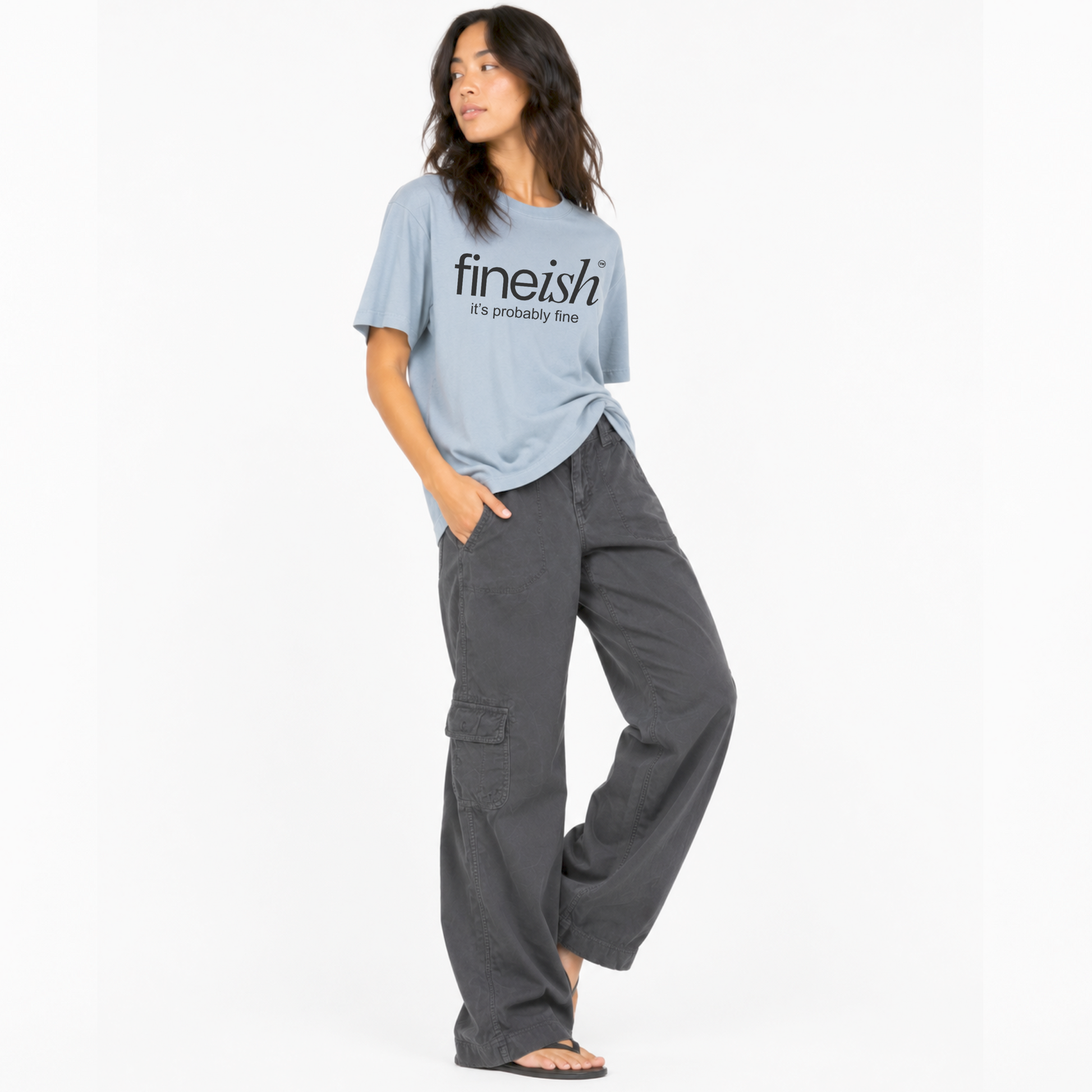 Model wearing the FINEish Original unisex graphic T-shirt with the "It's Probably Fine" design.