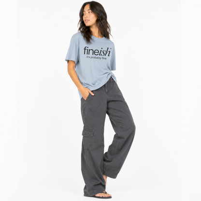 Model wearing the FINEish Original unisex graphic T-shirt with the "It's Probably Fine" design.