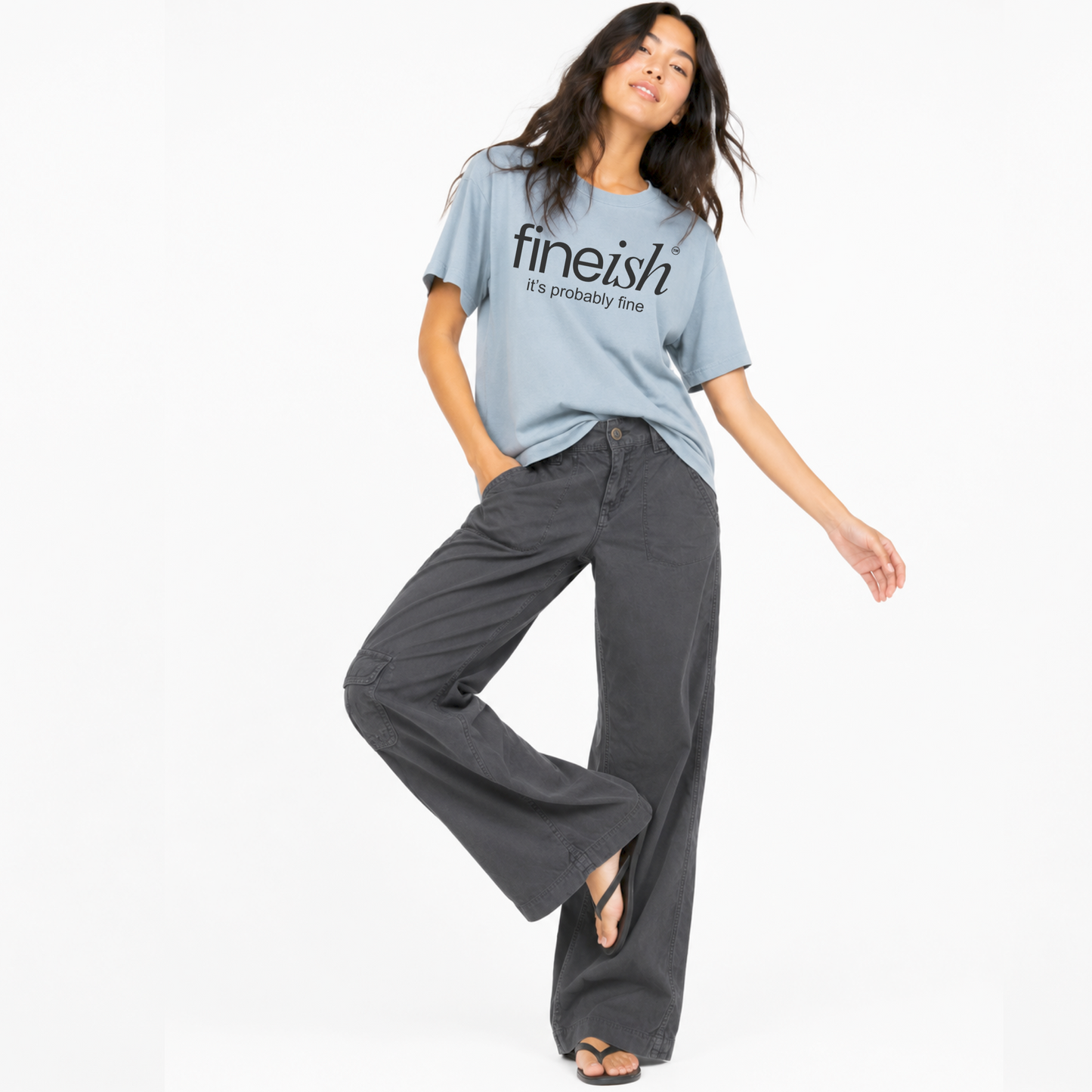 Close-up of the FINEish logo and "It's Probably Fine" graphic printed on a unisex T-shirt.