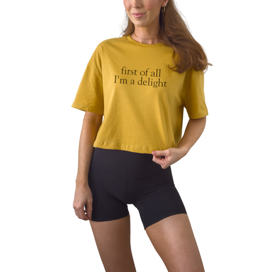 First of All I’m a Delight women’s crop t-shirt featuring playful confident statement design.