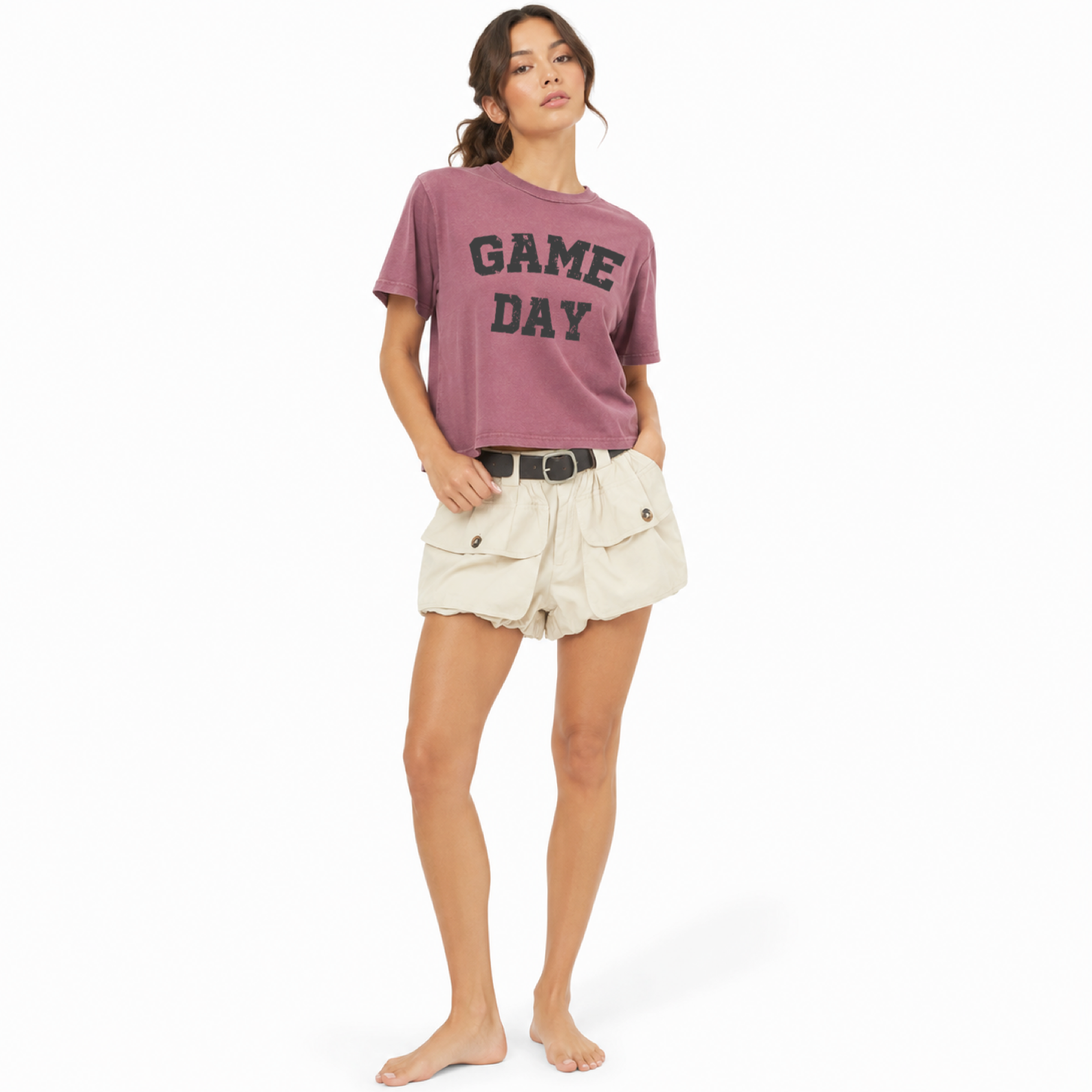 Lifestyle View
Model wearing a women’s Game Day football shirt with a relaxed fit for tailgating, stadium events, and football season.