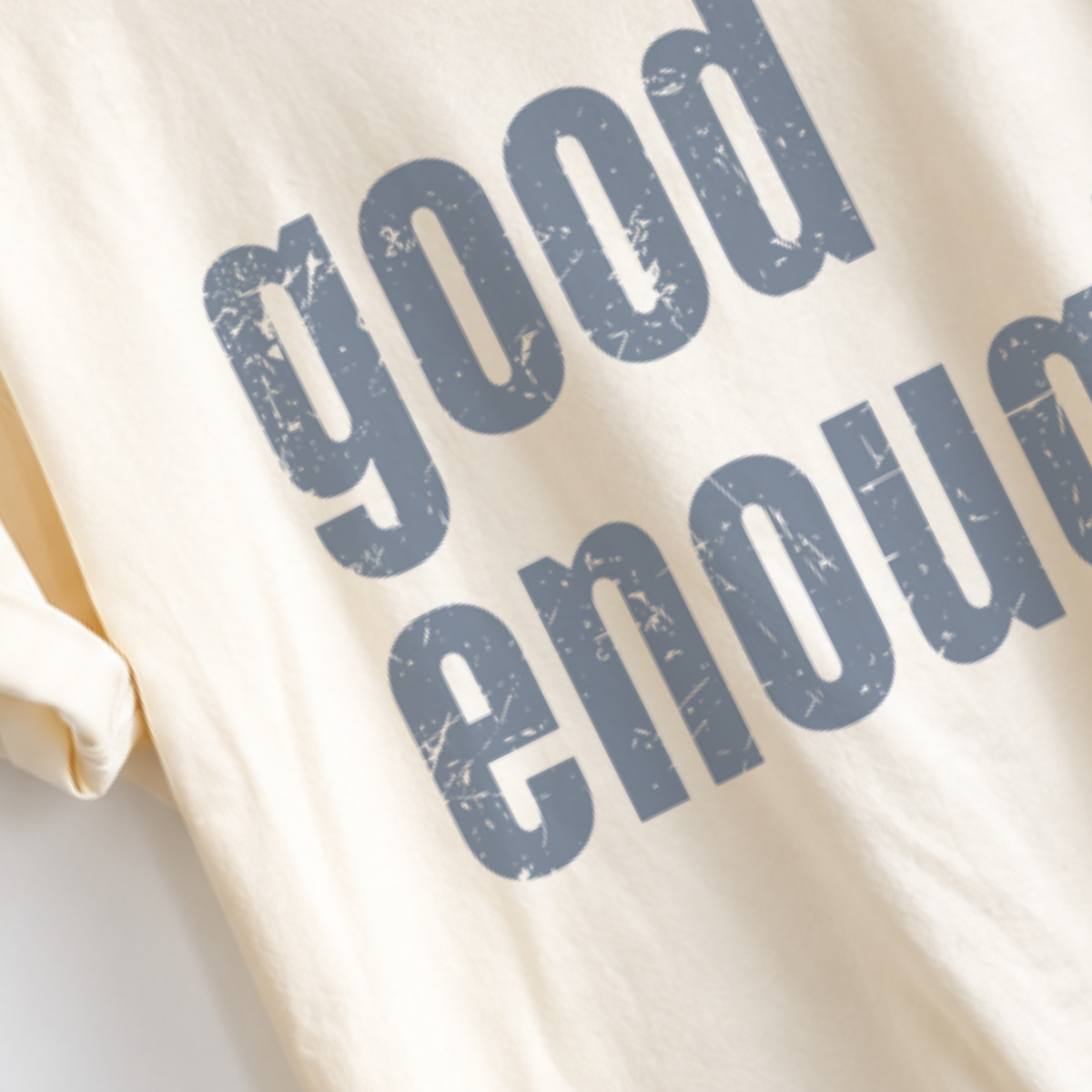 Good Enough boyfriend tee featuring a positive self-care message on the front, garment dyed heavyweight cotton, relaxed unisex sizing, crew neck, and a slightly oversized fit for women.