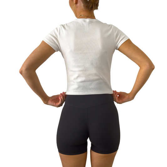 First of All I’m a Delight women’s baby tee featuring playful confident statement design. Women’s baby tee with First of All I’m a Delight quote. Trendy graphic top for everyday wear. First of All I’m a Delight statement printed on women’s baby tee graphic shirt.