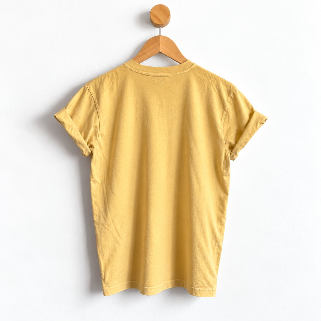 Back view of unisex garment dyed Thanksgiving boyfriend tee with heavyweight cotton fabric, relaxed unisex sizing, crew neck, short sleeves, and a slightly oversized fit.