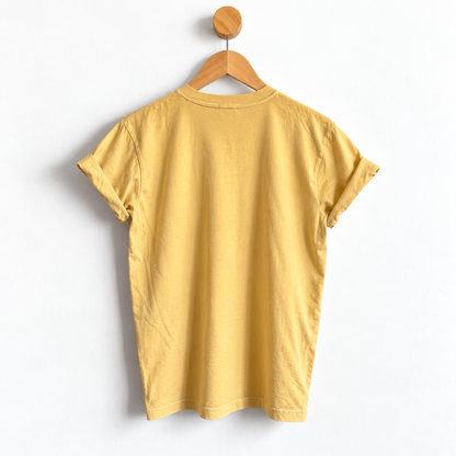 Back view of unisex garment dyed Thanksgiving boyfriend tee with heavyweight cotton fabric, relaxed unisex sizing, crew neck, short sleeves, and a slightly oversized fit.
