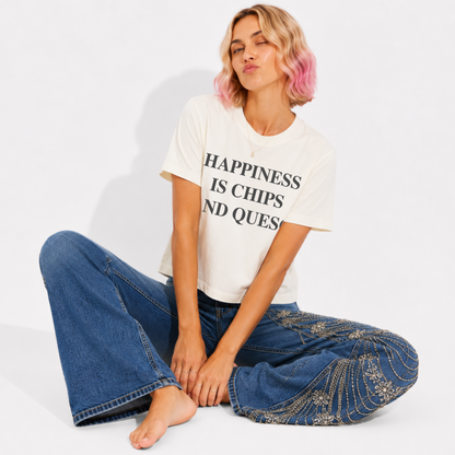Model wearing a women's garment-washed graphic tee with the fun "Happiness Is Chips & Queso" design.