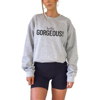 Hello Gorgeous graphic sweatshirt on unisex crewneck pullover. Cute statement sweater and empowering gift idea for women.