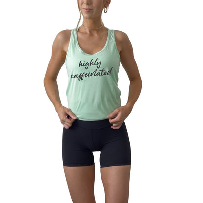 Coffee lover tank top featuring Highly Caffeinated statement design for espresso fans. Funny coffee graphic tank reading Highly Caffeinated for brunch outfits and everyday wear.