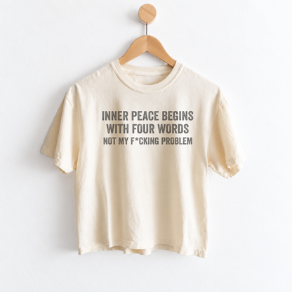 Women’s Inner Peace Begins With 4 Words Not My F*cking Problem graphic tee featuring a funny sarcastic self-care saying for women with a sense of humor. fineish women tee