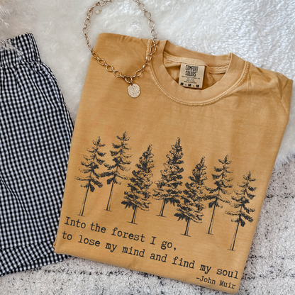 Nature inspired Into the Wild I Go hiking shirt on unisex graphic tee. Adventure quote t-shirt for campers, mountain lovers, and outdoor explorers.