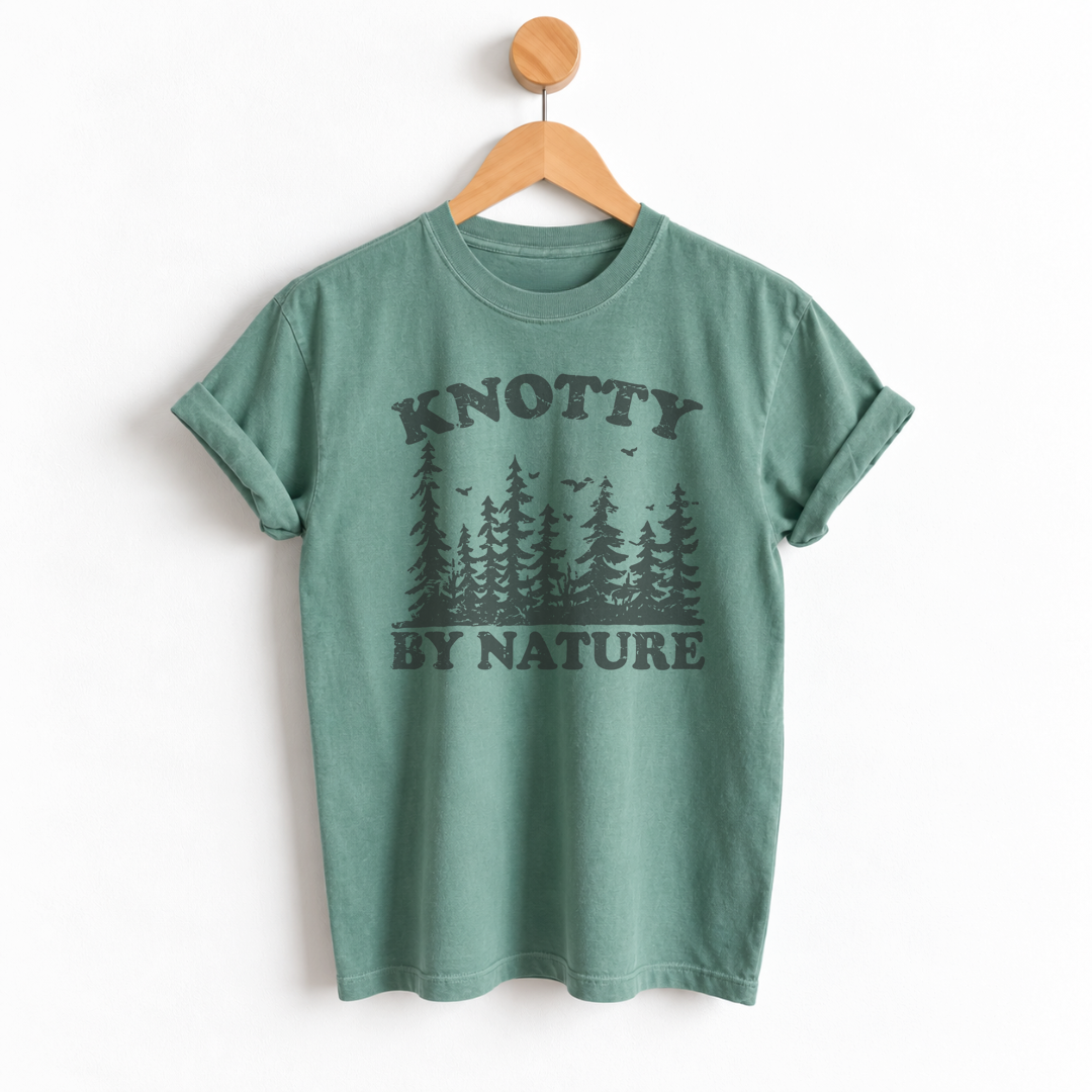 Knotty by Nature boyfriend tee featuring a playful tree and nature inspired graphic, perfect for nature lovers, outdoor adventures, hiking, camping, and woodland style. Shop Fineish