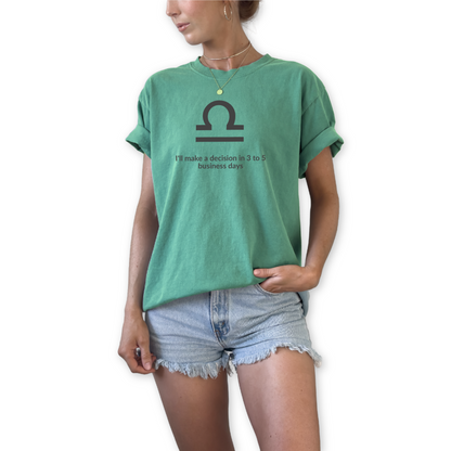 Libra zodiac t-shirt featuring “I’ll Make a Decision in 3 to 5 Business Days.” Funny astrology shirt for September and October birthdays. Air sign graphic tee for horoscope lovers who embrace indecisive personality traits.