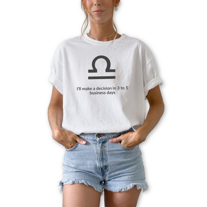 Libra zodiac t-shirt featuring “I’ll Make a Decision in 3 to 5 Business Days.” Funny astrology shirt for September and October birthdays. Air sign graphic tee for horoscope lovers who embrace indecisive personality traits.