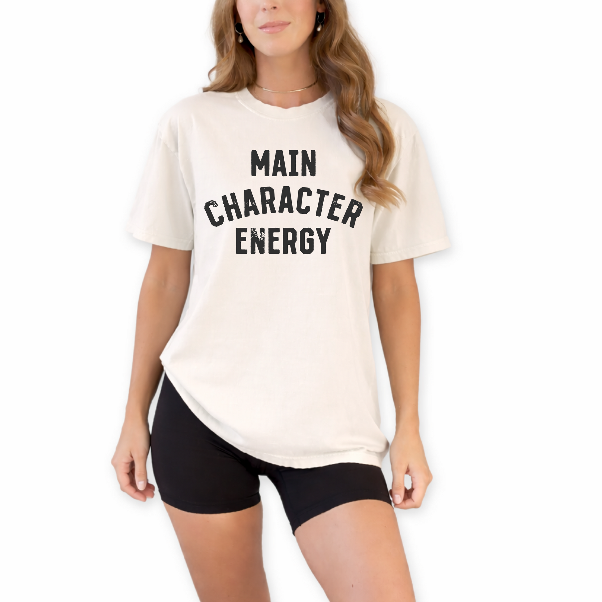 Unisex retro Main Character Energy graphic t-shirt styled for trendy streetwear and confident everyday outfit. Minimalist trendy outfit shirt paired with denim and sneakers for cool casual street style
