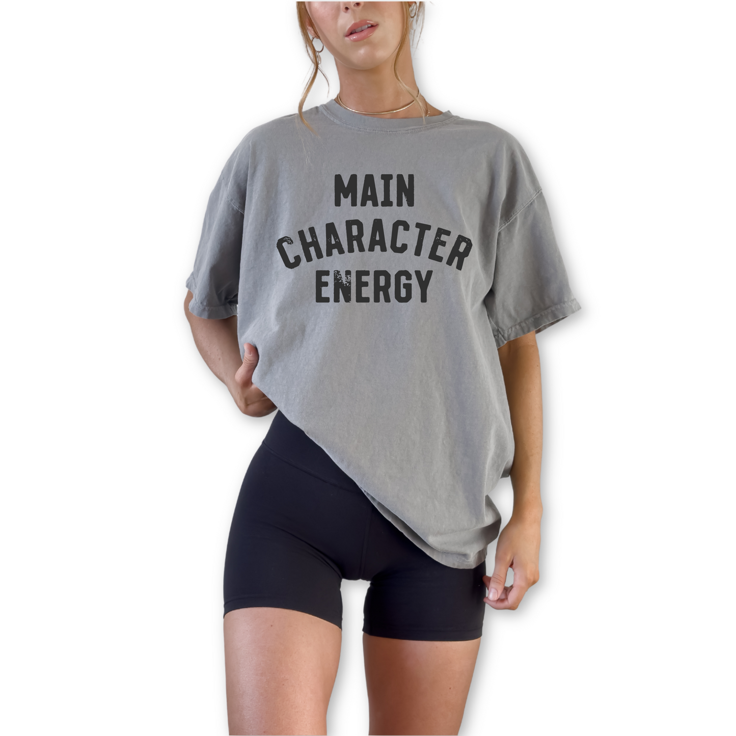 Unisex retro Main Character Energy graphic t-shirt styled for trendy streetwear and confident everyday outfit. Minimalist trendy outfit shirt paired with denim and sneakers for cool casual street style