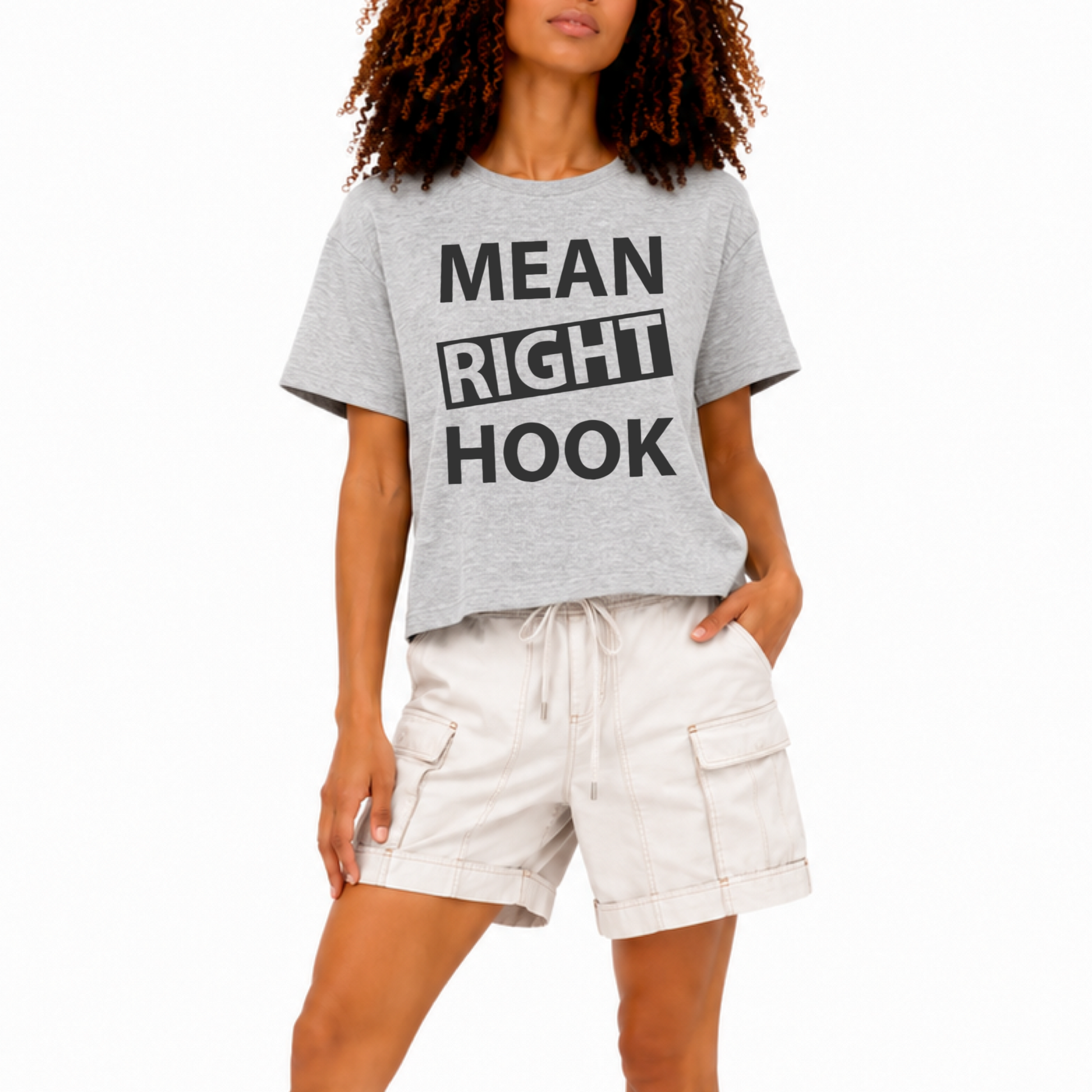 Close-up of the “Mean Right Hook” graphic printed on an athletic heather grey women’s boxy crop T-shirt.