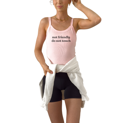 Not Friendly Do Not Touch women’s ribbed crop tank with bold sarcastic statement design. Women’s ribbed crop tank top featuring Not Friendly Do Not Touch graphic.