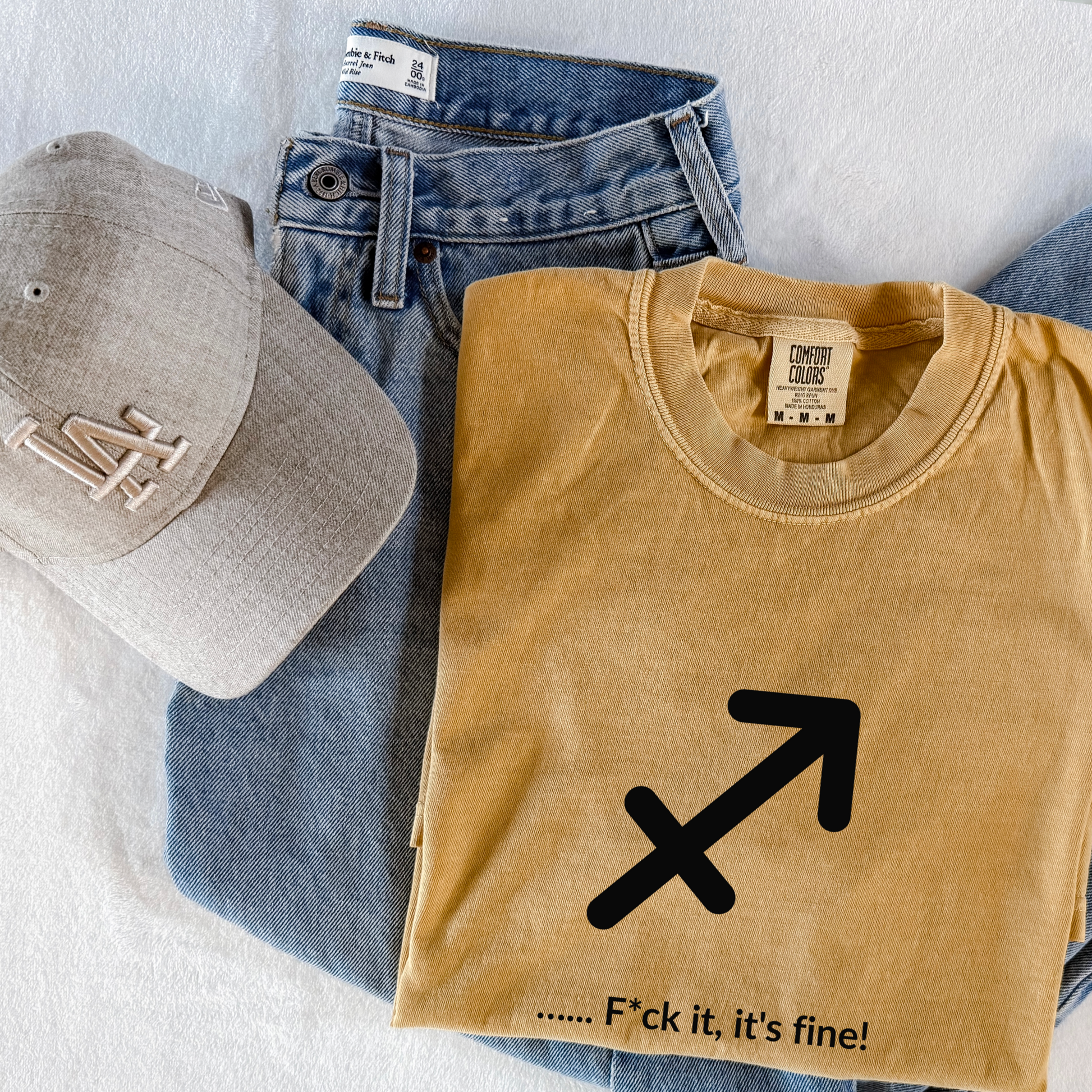 Sagittarius astrology shirt with “F*ck It, It’s Fine!” quote. Zodiac graphic tee for spontaneous, optimistic fire sign personalities born in November and December.