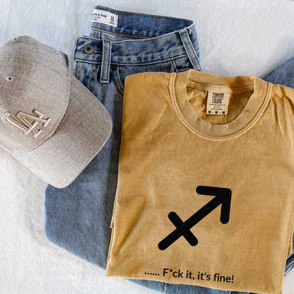 Sagittarius astrology shirt with “F*ck It, It’s Fine!” quote. Zodiac graphic tee for spontaneous, optimistic fire sign personalities born in November and December.