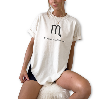 Scorpio zodiac horoscope t-shirt featuring “F*ck Around and Find Out.” Bold astrology shirt for October and November birthdays. Water sign graphic tee for intense horoscope lovers.