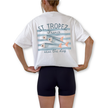 Seas the Day St Tropez France retro unisex t-shirt featuring sardine coastal graphic design. Vintage French Riviera beach shirt with Seas the Day slogan and seaside artwork.