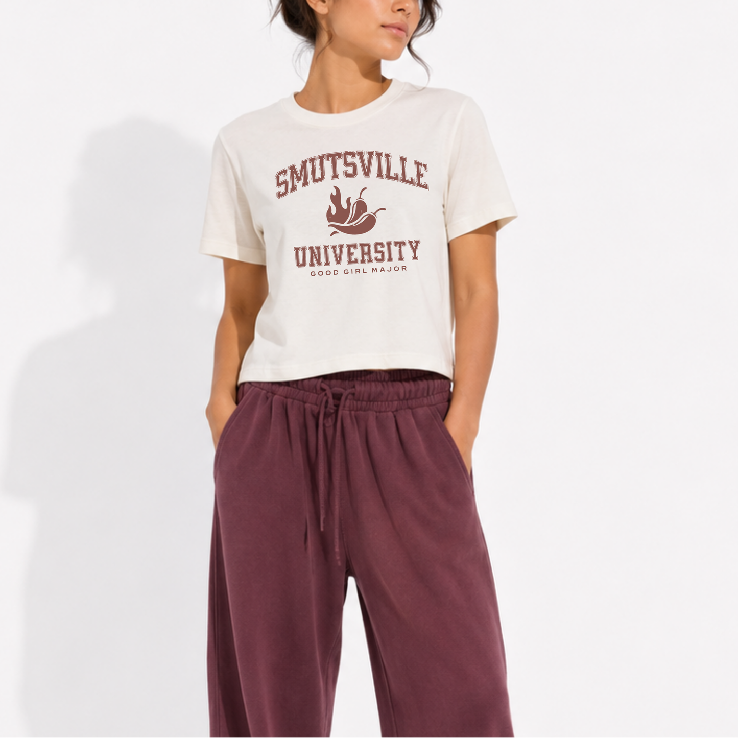Vintage-inspired Smutsville University Good Girl Major women's garment-dyed t-shirt for romance readers, book lovers, bibliophiles, and spicy book fans.